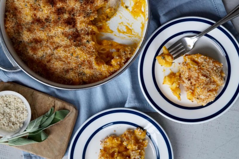 Gluten free butternut squash mac and cheese in a pan.