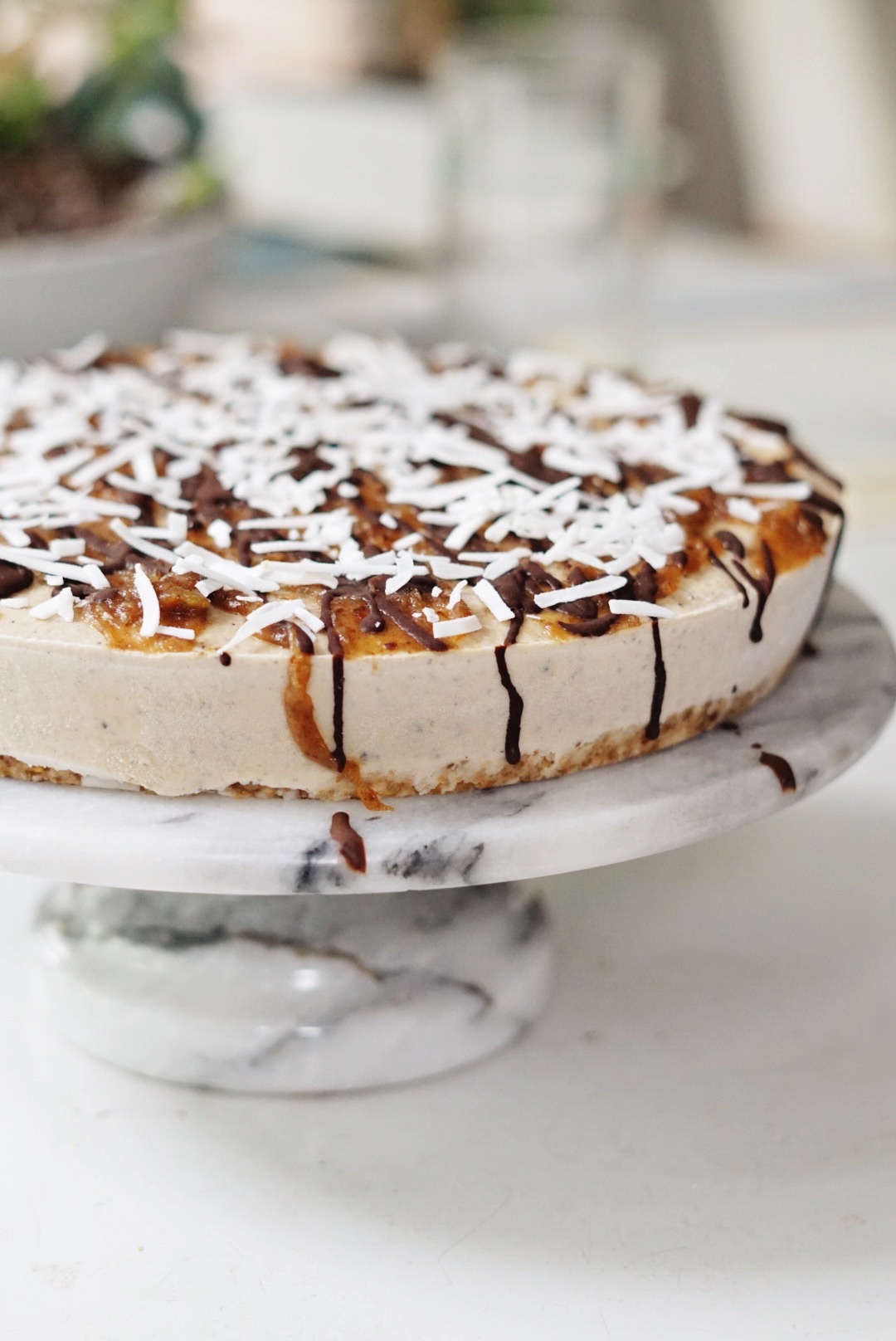 vegan coffee cheesecake with caramel and coconut